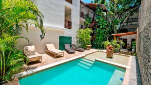 The swimming pool at or close to Kanté Hotel - Downtown Tulum