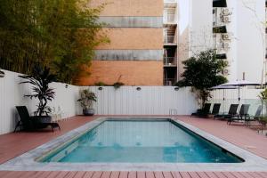 a swimming pool in the middle of a building at Punthill Spring Hill in Brisbane