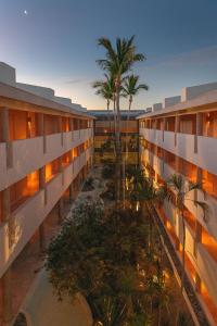 an aerial view of a building with palm trees at Paradisus by Meliá Los Cabos - Adults Only - All Inclusive in San José del Cabo +120 photos