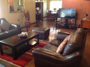 Posezení v ubytování Benconi Lodge