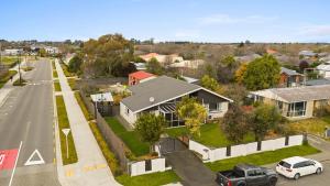 an aerial view of a house in a residential neighborhood at Brookside Residence in Rolleston
