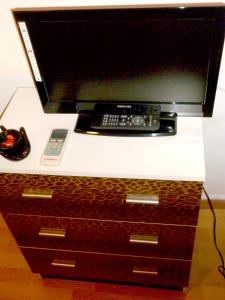 a computer monitor sitting on top of a desk at I Cinque Continenti in Palermo