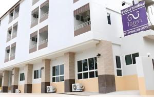 a view of the front of a building at Iyara Residence in Trat