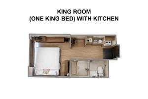 a picture of a one king bedroom apartment with kitchen at goom Hotel Nakasu in Fukuoka