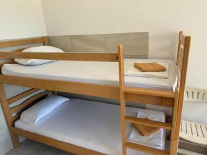 a set of bunk beds in a room at Studio Apartment Sanja 1 in Neum