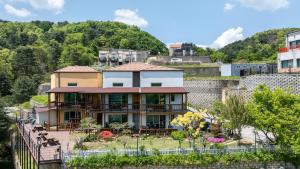 a house on the side of a hill at Gapyeong Art Pension in Gapyeong