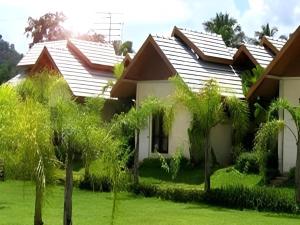 a house with solar panels on its roof at Pangsarapee Resort in Ban Bo Nam Khao
