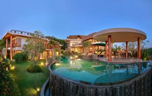 an image of a house with a swimming pool at Casa Bonita Villa Bali in Jimbaran