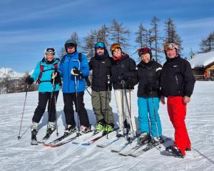 a group of people on skis in the snow at Redroofs in Tenbury
