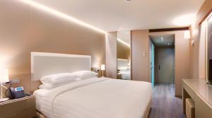 Posteľ alebo postele v izbe v ubytovaní Saz City Life Boutique Hotel