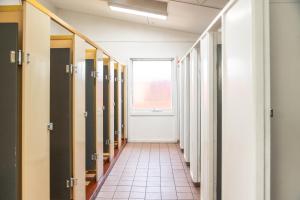 a corridor of a dressing room with a window at Geelong Holiday Park in Geelong +94 photos