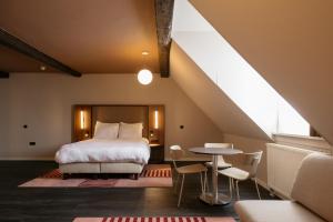 Ένα ή περισσότερα κρεβάτια σε δωμάτιο στο Hotel Vrythof - just a room - digital key by email or SMS