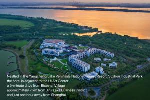 an aerial view of a resort near the water at Suzhou Marriott Hotel Yangcheng Lake in Suzhou +119 photos