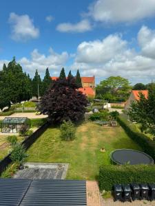 a view of the garden from the roof of a building at The Hidden Sea View in Sønderborg