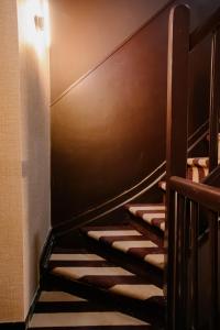 een trap in een gebouw bij Hotel Vrythof - just a room - digital key by email or SMS in Maastricht