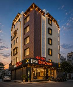 a hotel building with a hotel right corner at Hotel Rich Comfort Ajmer in Ajmer