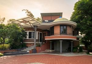 a house with a dome on top of it at Vayal Heritage Villa in Angamaly