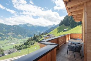 a balcony with a view of the mountains at Chalet Ahornblick in Mühlen