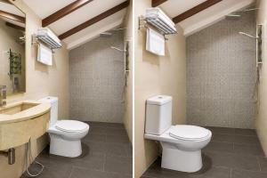 a bathroom with two toilets and a sink at Swiss Heritage Boutique Hotel Jonker Street Melaka in Malacca +42 photos