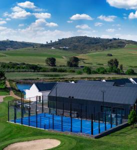 an overhead view of a building with a swimming pool at The Hazendal Hotel and Spa in Stellenbosch