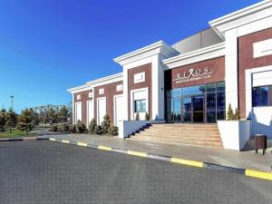a store front of a building on a street at Rixos Borovoe in Borovoye
