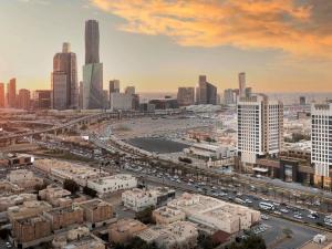 a view of a city with buildings and traffic at Movenpick Hotel and Residences Riyadh in Riyadh