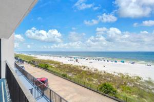 a balcony with a view of the beach at Aquavista 304W in Panama City Beach