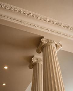 a close up of a column in a building at Hôtel Derby Eiffel in Paris