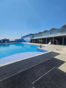 a large swimming pool in the middle of a building at NectaraVilla PooL in Ashtarak