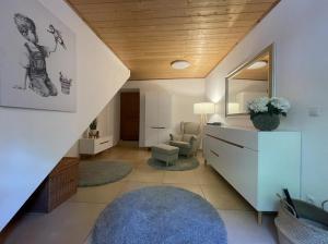 a living room with a vanity and a mirror at Chalet Notschkerl in Waasen +34 photos