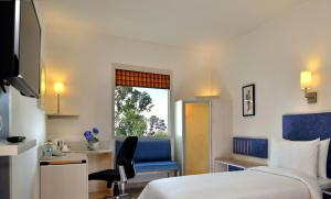 Fotografie z fotogalerie ubytování Red Fox by Lemon Tree Hotels, Bhiwadi v destinaci Bhiwadi