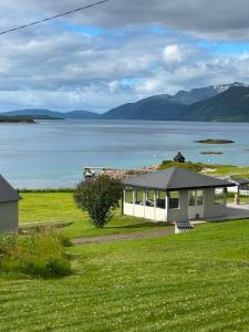 a house with a view of a body of water at Senja seaside retreat in Senja