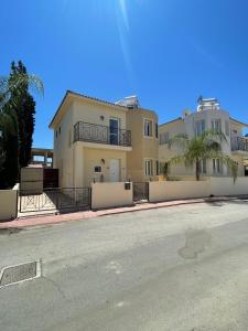 a house on the side of a street at Villa Flory in Protaras