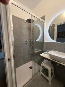 a bathroom with a shower and a sink at Cecia's House in Bassano del Grappa +40 photos