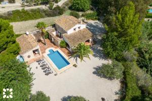 an aerial view of a house with a swimming pool at Villa Fantaxat by Abahana Villas in Benissa