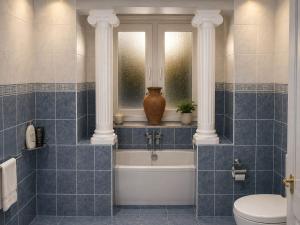 a bathroom with a tub and a toilet and a window at Dalyan Palace in Dalyan +36 photos