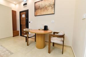 a dining room with a table and some chairs at Dream Palace 1 in Belgrade