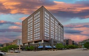 a rendering of a tall building in a city at Hyatt House Chicago West Loop-Fulton Market in Chicago