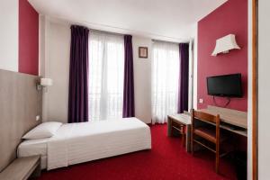 a hotel room with a bed and a desk at Get My Hatch Bergère in Paris