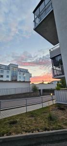 a building with a balcony on the side of a road at Plutogatan PentHouse  +18 photos