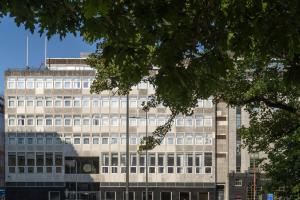 a large building with a lot of windows at Point A Hotel Edinburgh St Andrew Square in Edinburgh