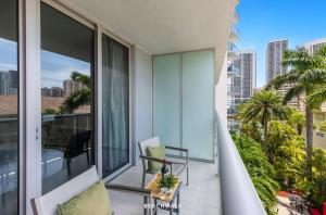 an apartment balcony with a view of the city at Pininfarina Studio Intracoastal View in Hallandale Beach