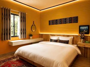 a bedroom with a large bed and a window at Mộc An SaPa Home in Sapa +9 photos