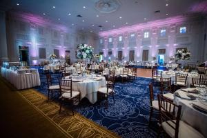 a banquet hall with tables and chairs in a building at Sentinel Hotel in Portland +220 photos