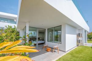 a view of the backyard of a house at Villa Veiga with heated pool in Callao Salvaje