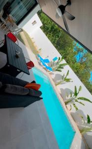 an image of a swimming pool at a resort at Villa La Vida Dulce Private Pool Near Playa Dorada in Puerto Plata
