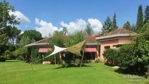 a tent in the yard of a house at Gaia B&B in Castrovillari