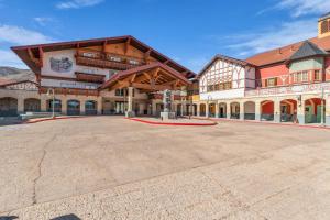 a large building with a red carpet in front of it at Zermatt Mountain Lodge Studio in Midway