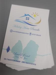 a envelope with a picture of a house on it at Holiday House Piccirillo in Vietri sul Mare +23 photos