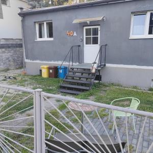 a house with a staircase in front of it at Redkot 40A in Zielona Góra